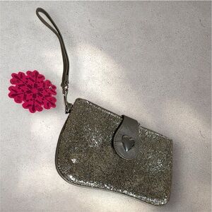 Candie’s silver clutch or wristlet